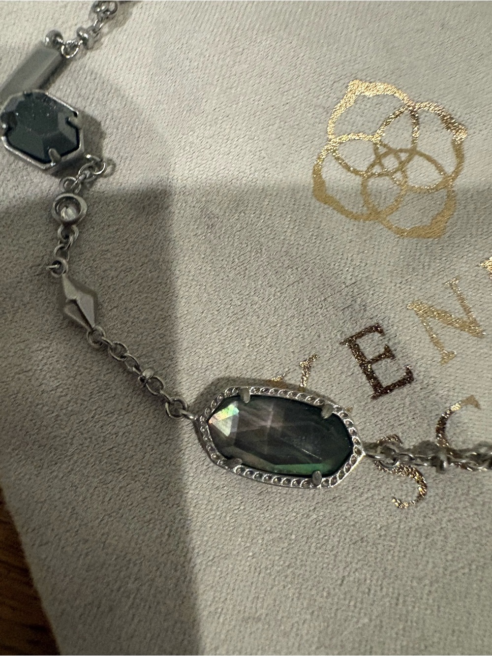 Kendra Scott Silver Necklace (adjustable) with iridescent and silver stones